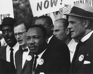 756px-Civil_Rights_March_on_Washington,_D.C._(Dr._Martin_Luther_King,_Jr._and_Mathew_Ahmann_in_a_crowd.)_-_NARA_-_542015_-_Restoration